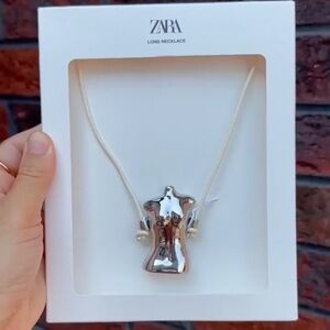 ZARA BUST CHARM NECKLACE